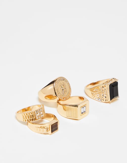 ASOS DESIGN - Set van 5 zegelringen met embleem en kristallen in goudkleur