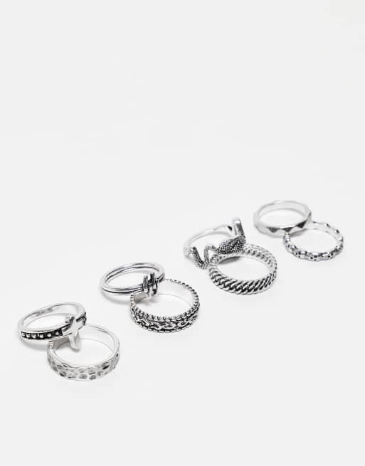 ASOS DESIGN - Set van 8 platte ringen met doodshoofd- en kruisje in gepolijste zilverkleur