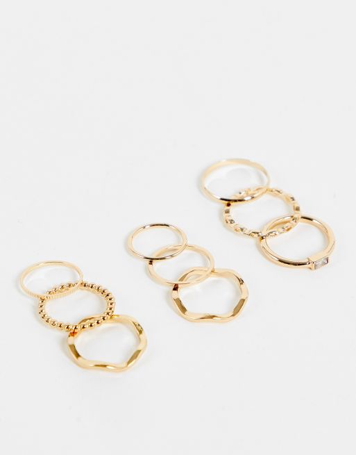 ASOS DESIGN - Set van 9 midi-ringen in goudkleur