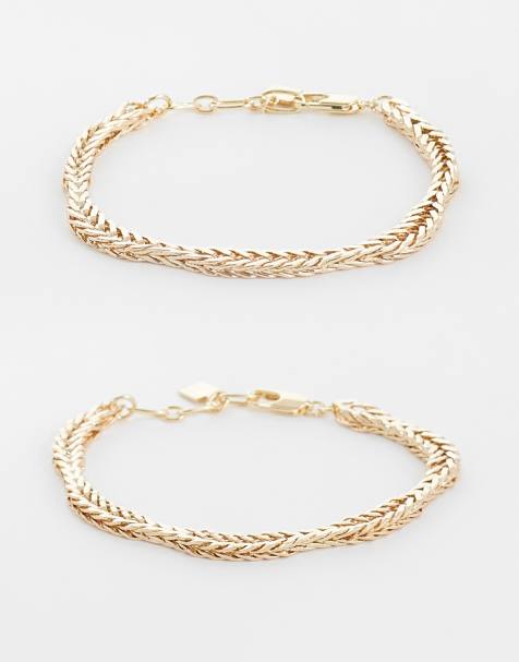 ASOS DESIGN - Set van brede schakelarmbanden in goudkleur - view 1