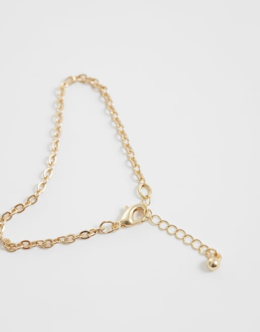 ASOS DESIGN - Set van gemengde kralenarmbanden in bordeauxrood en goudkleur, 3 van 3