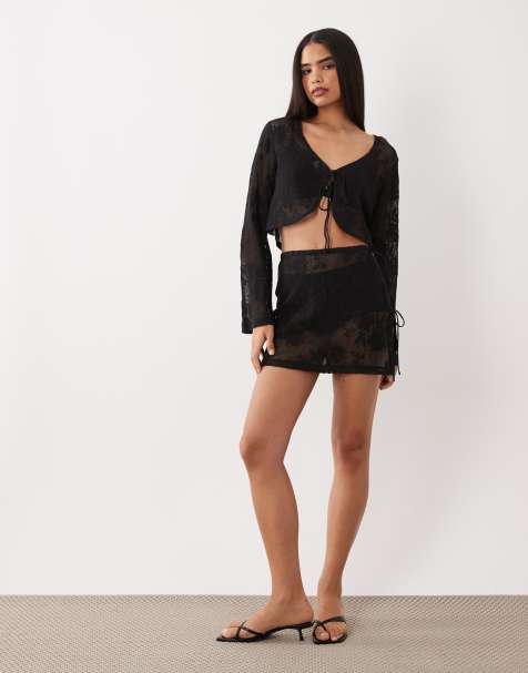 ASOS DESIGN sheer crochet lace tie side beach mini skirt in black - view 1