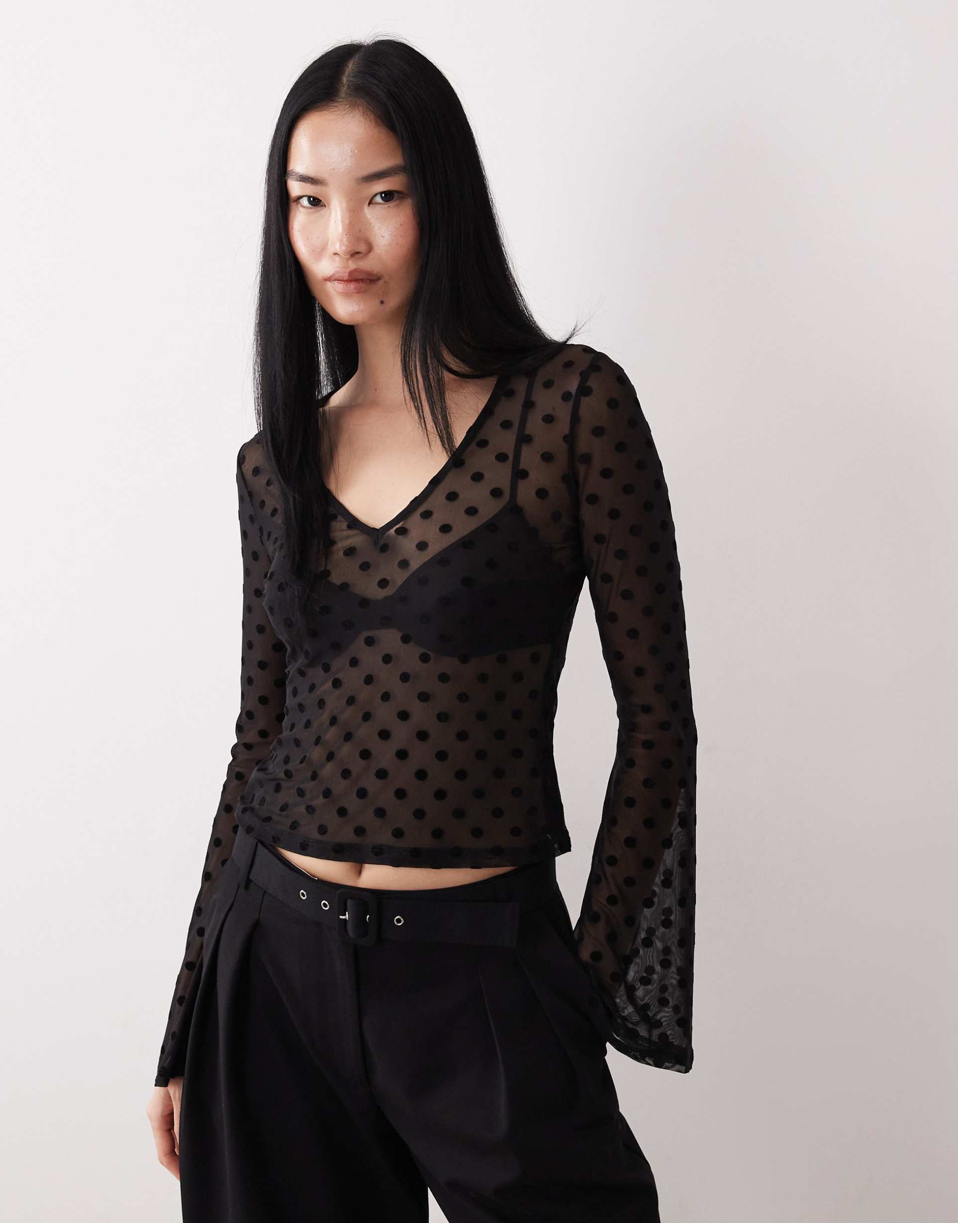 asos design sheer flock spot mesh long sleeve top in black
