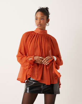 Asos Design Sheer High Neck Top With Tie Cuff Detail In Rust-red