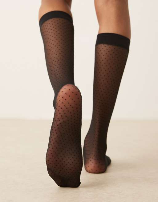 ASOS DESIGN sheer knee high socks in micro polka dot