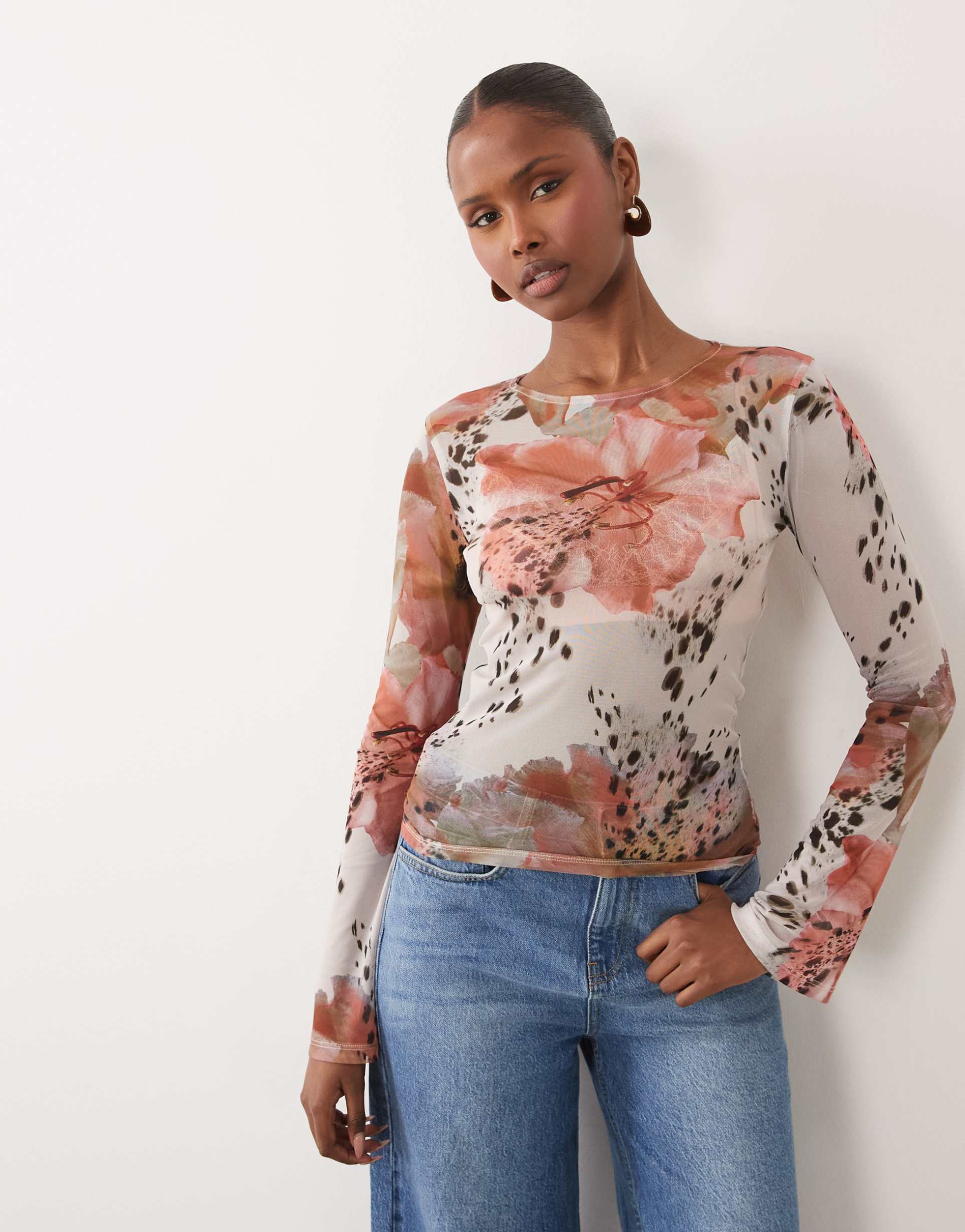 asos design sheer mesh flare long sleeve top in spotted floral