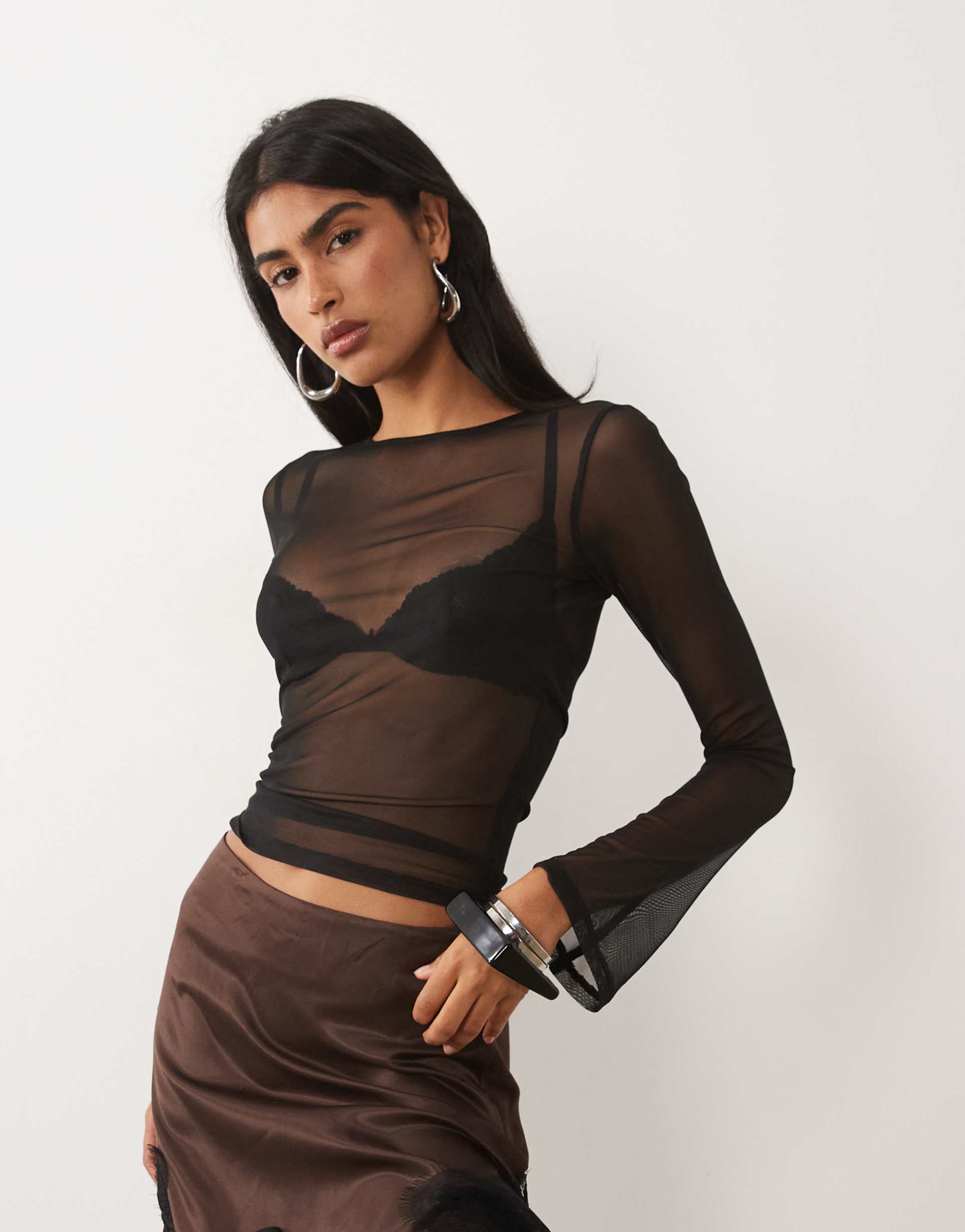 asos design sheer mesh flared long sleeve top in black