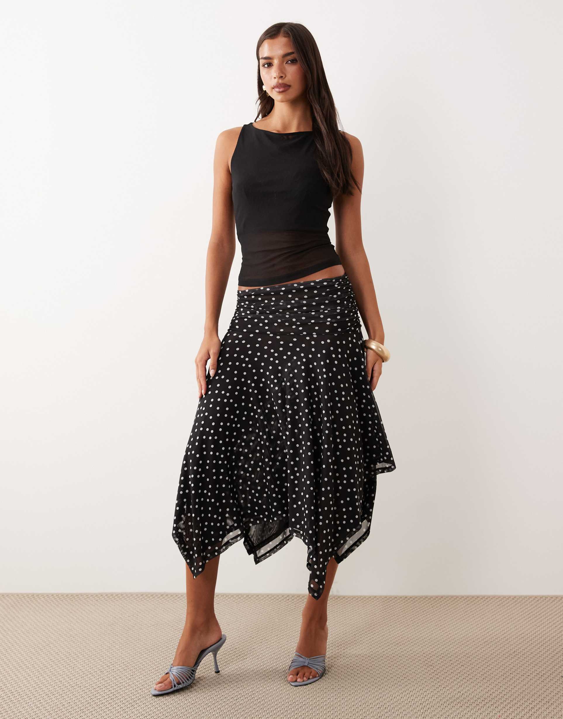 asos design sheer mesh hanky hem skirt in black polka dot