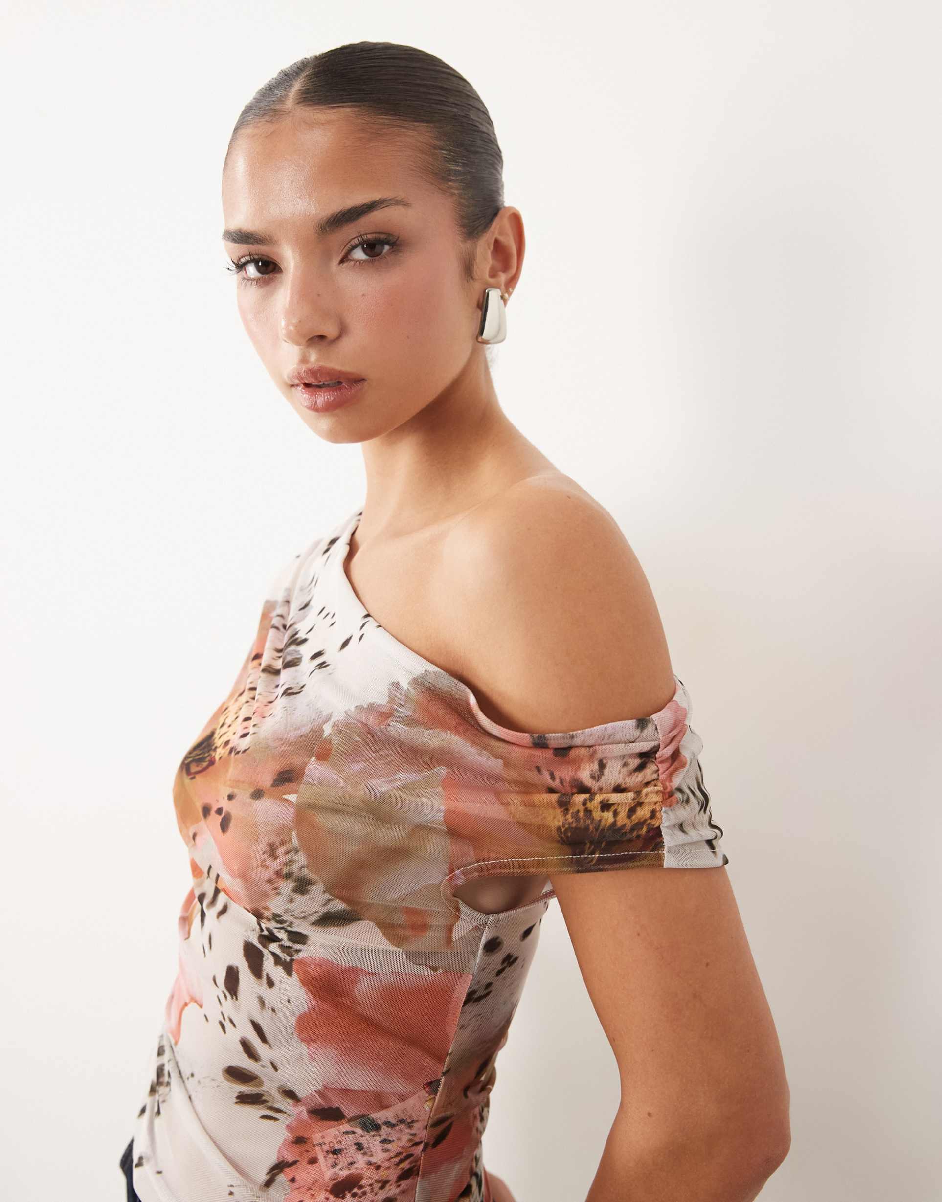 asos design sheer mesh ruched off shoulder asymmetric top in spotted floral