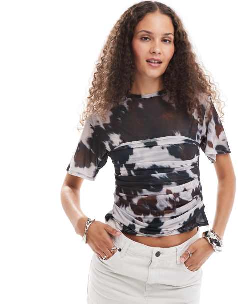 ASOS DESIGN sheer mesh short sleeve corset waist top in cow print - view 1