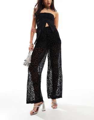 ASOS DESIGN sheer pull on trousers in black burnout animal print - view 1