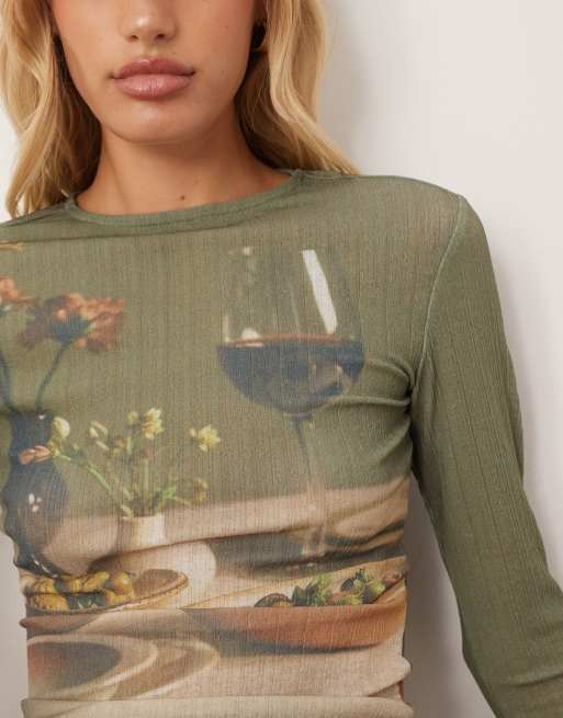 ASOS DESIGN sheer rib knit dinner party scene graphic printed top in olive