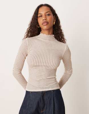 ASOS DESIGN sheer ribbed long sleeve top in cream polka dots
