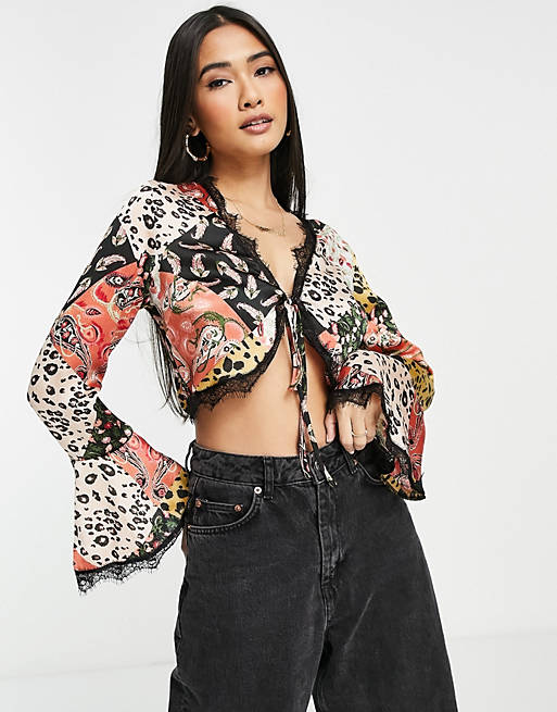 Tops Shirts & Blouses/sheer tie front crop with flare sleeve and lace detail in patchwork print 