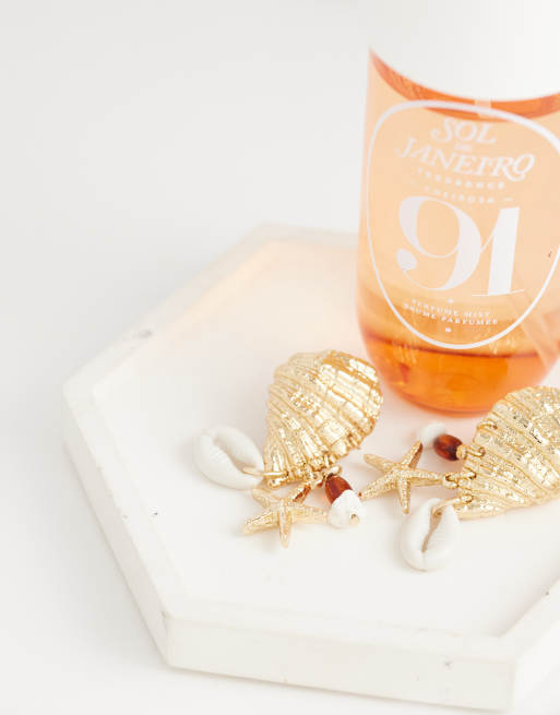ASOS DESIGN shell stud earrings with sea-life charms in gold tone, 2 of 4