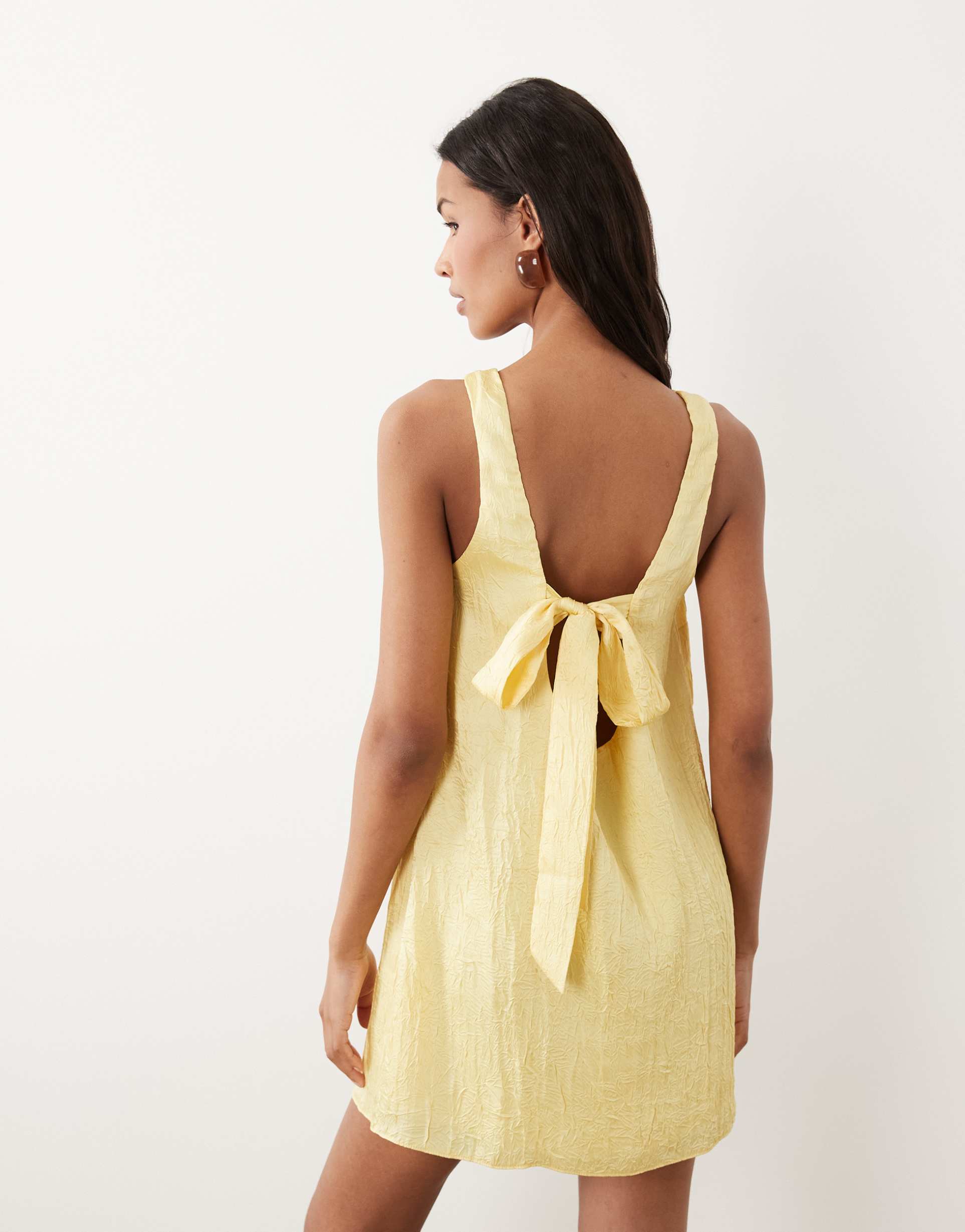 asos design shift mini dress with bow back detail in yellow