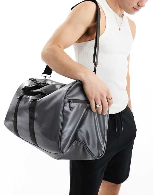 ASOS DESIGN shiny nylon duffle bag in charcoal ASOS