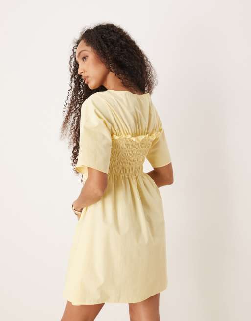 ASOS DESIGN shirred babydoll trapeze mini dress in buttermilk
