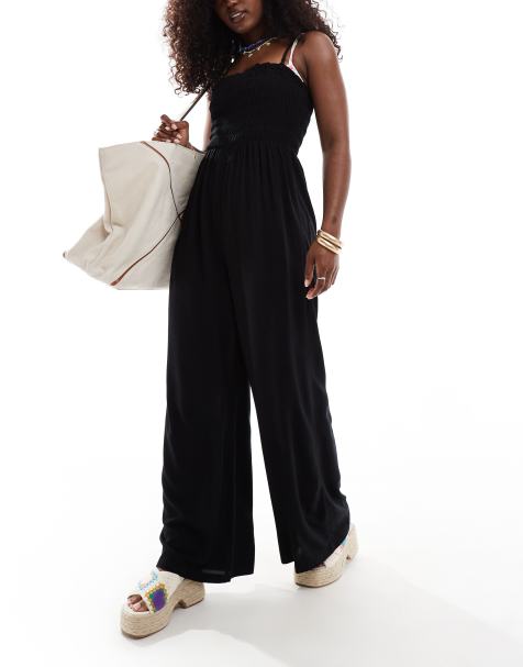 ASOS DESIGN shirred bandeau beach jumpsuit in black - view 1