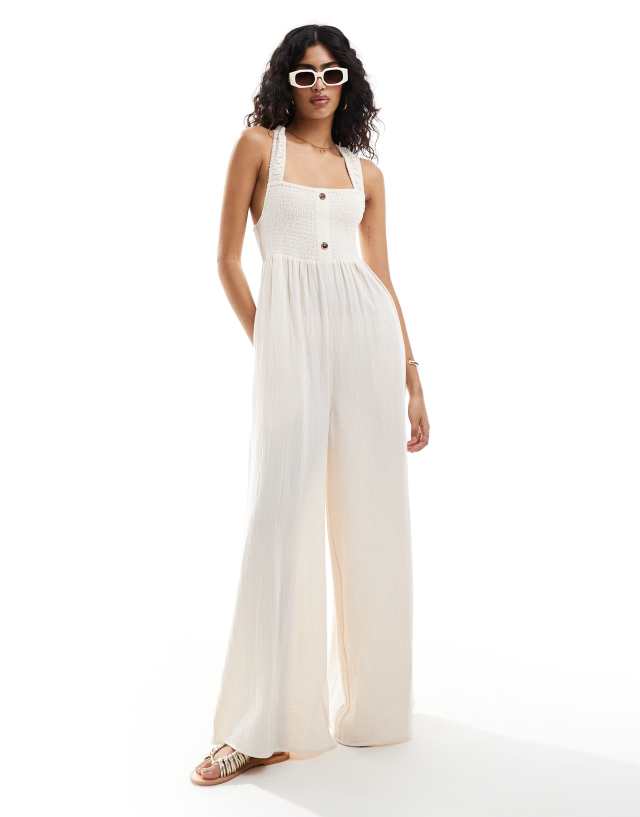 ASOS DESIGN - shirred bodice jumpsuit with elastic straps in ivory