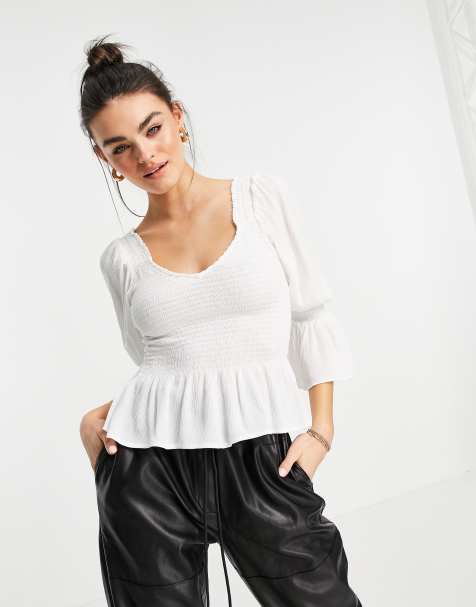 ASOS DESIGN shirred bodice peplum top in ivory - view 1