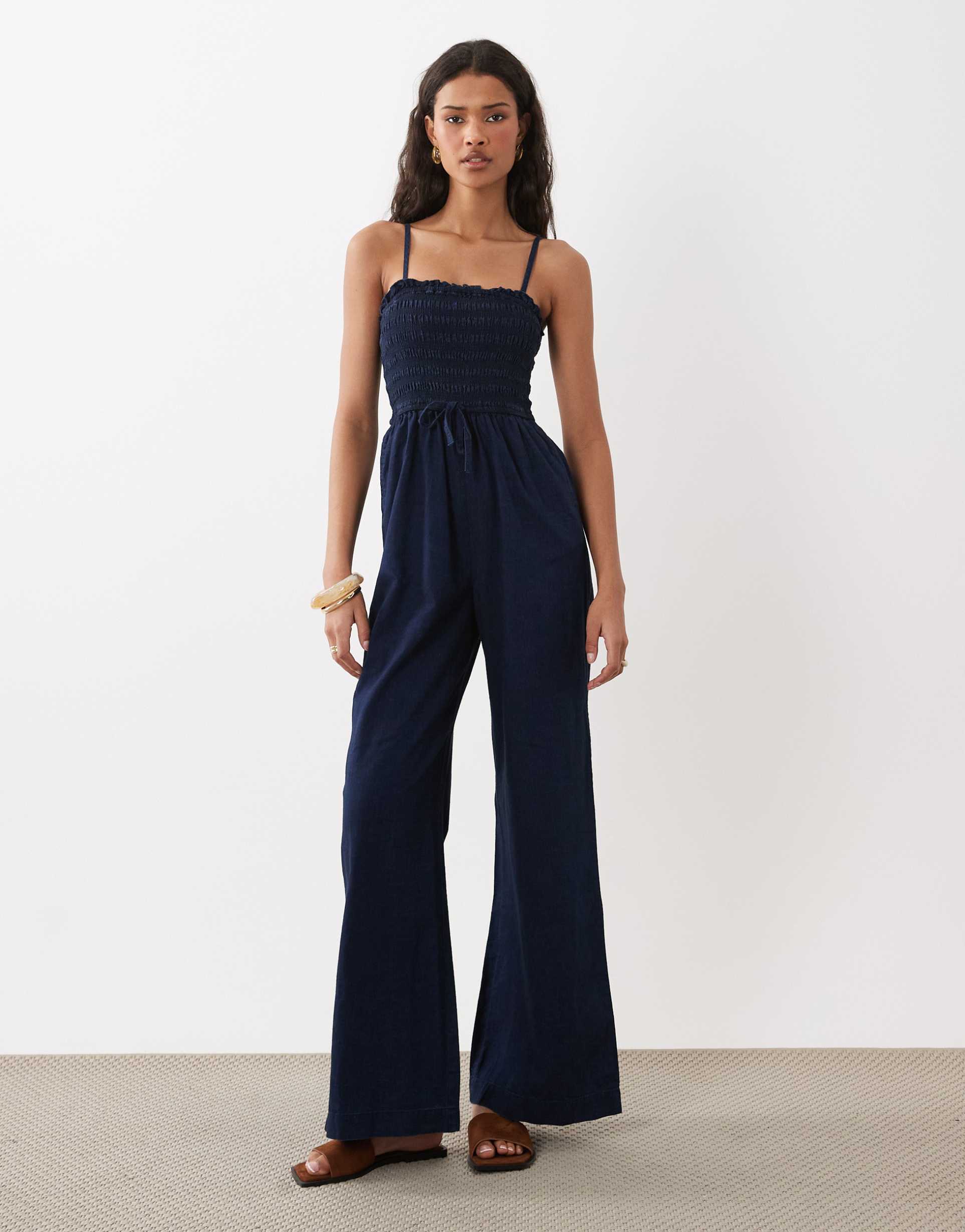 asos design shirred denim jumpsuit with parachute pant leg in inky wash