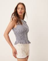 ASOS DESIGN sleeveless top with tie waist details in red gingham