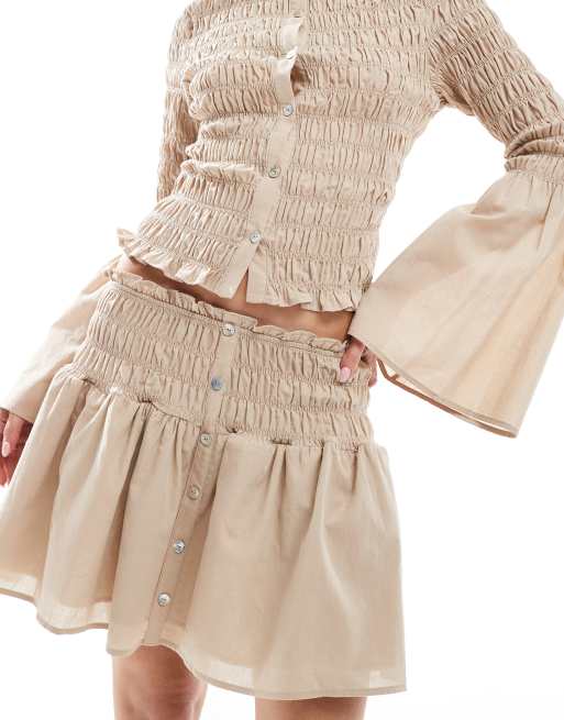 ASOS DESIGN shirred drop waist mini skirt in neutral