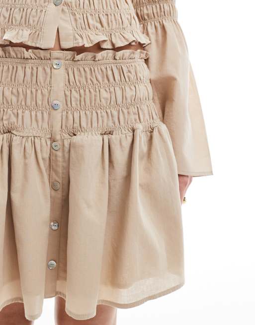 ASOS DESIGN shirred drop waist mini skirt in neutral