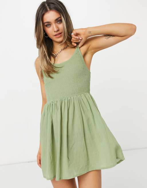 ASOS DESIGN shirred mini skater sundress with scoop back ASOS DESIGN shirred mini skater sundress with scoop back