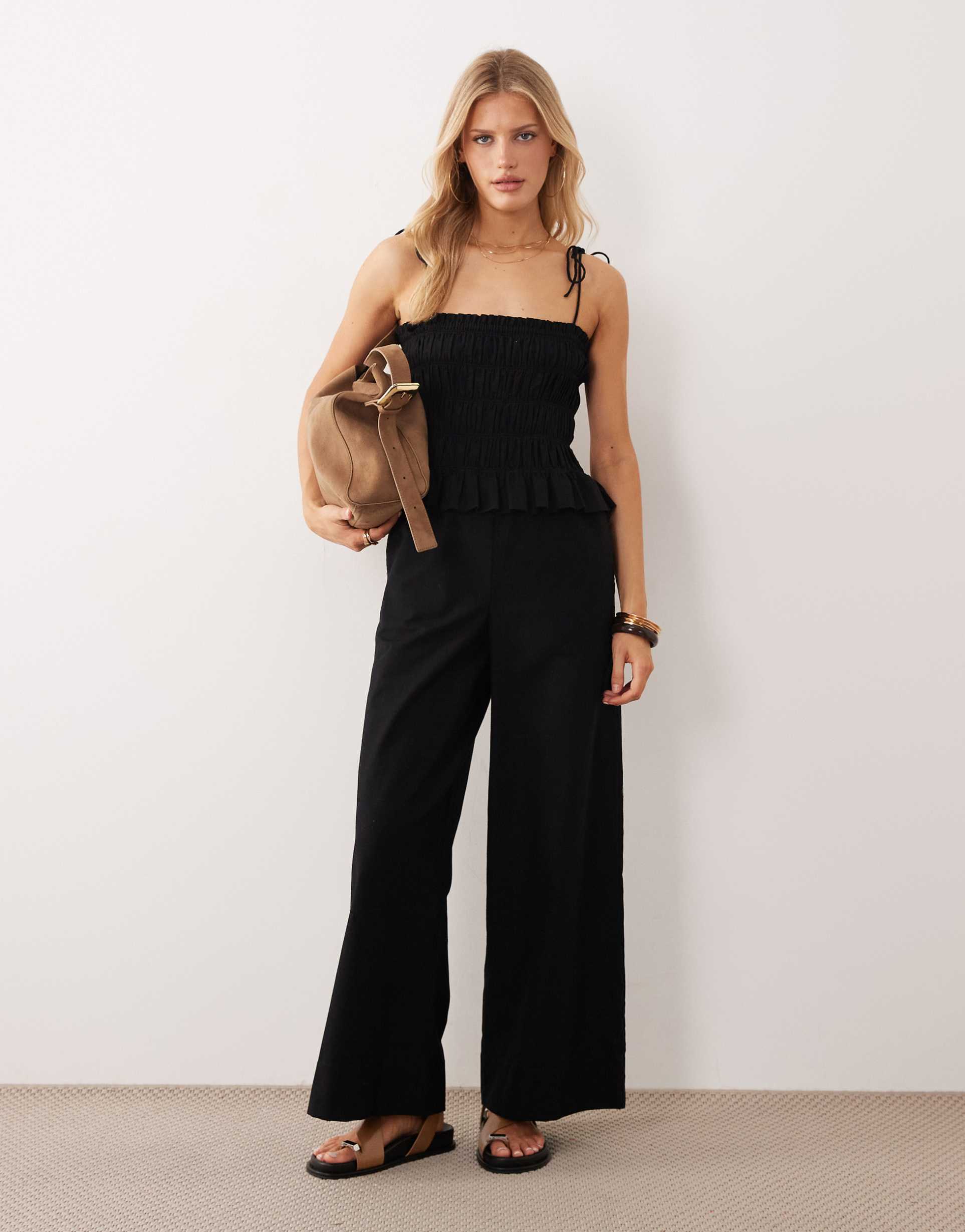 asos design shirred peplum waist jumpsuit in black