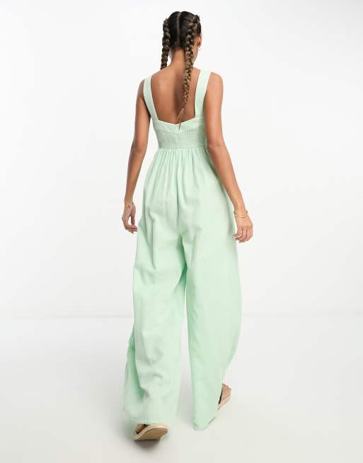 ASOS DESIGN shirred pinafore jumpsuit in sage