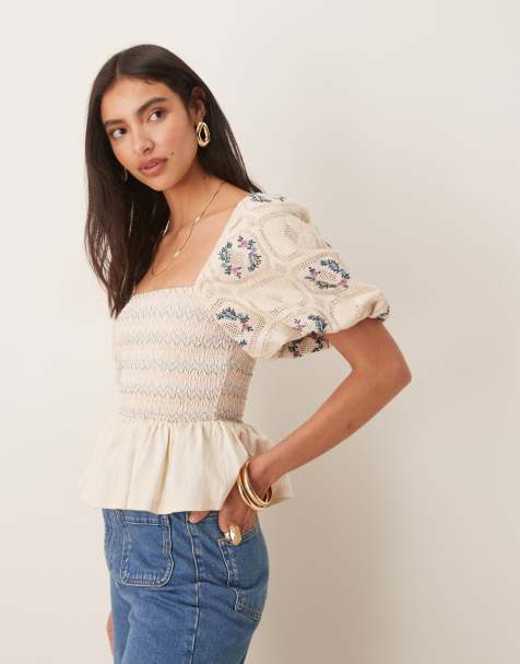 ASOS DESIGN shirred puff sleeve peplum hem top in ivory - view 1