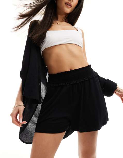 ASOS DESIGN shirred waist flippy shorts in black - view 1