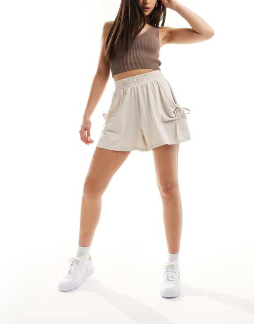 ASOS DESIGN shirred waist pocket shorts in stone