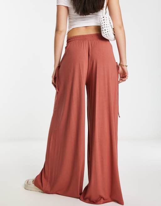 ASOS DESIGN shirred waist pocket wide leg pants in rust