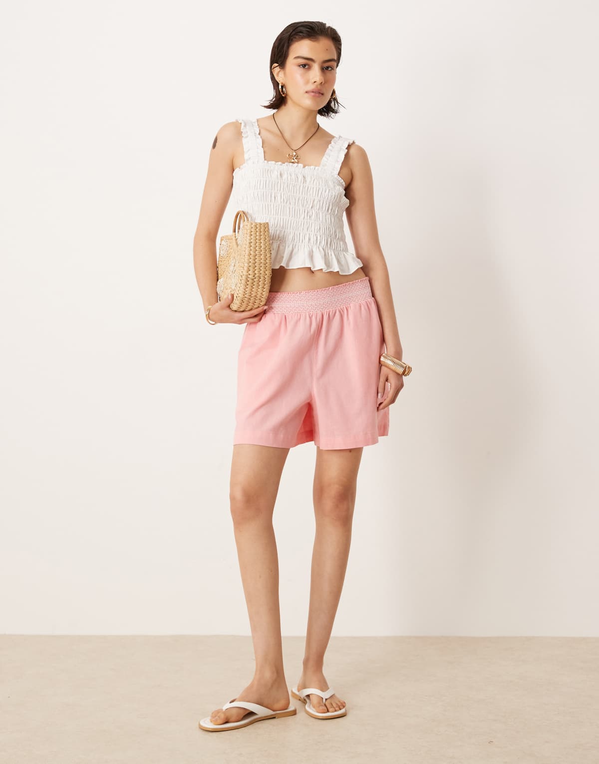 ASOS DESIGN shirred waist shorts in pink with white