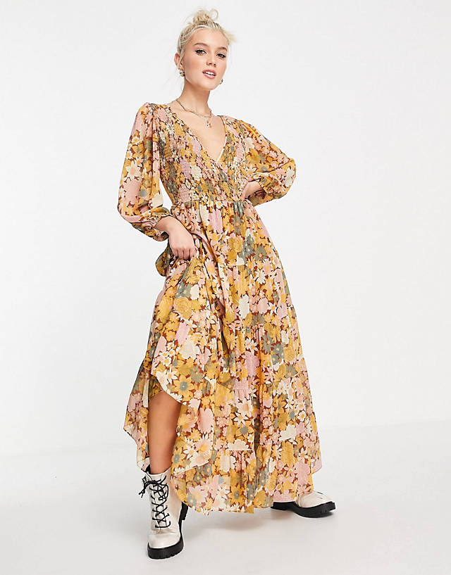 ASOS DESIGN - shirred wrap  tiered skirt maxi dress in mustard floral print