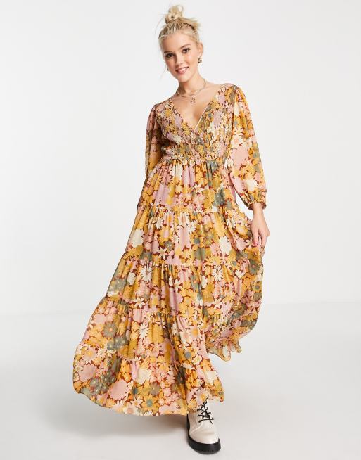 ASOS DESIGN shirred wrap tiered skirt maxi dress in mustard floral print