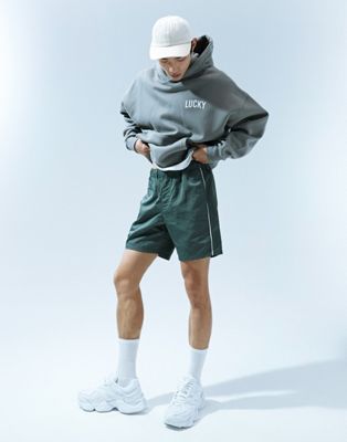 ASOS DESIGN slim nylon shorts with piping detail in khaki - ASOS Price Checker