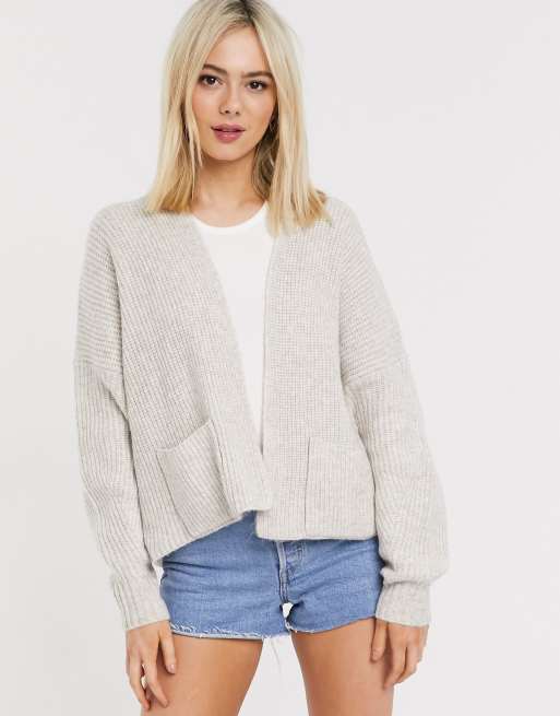 Short cardigan with on sale pockets