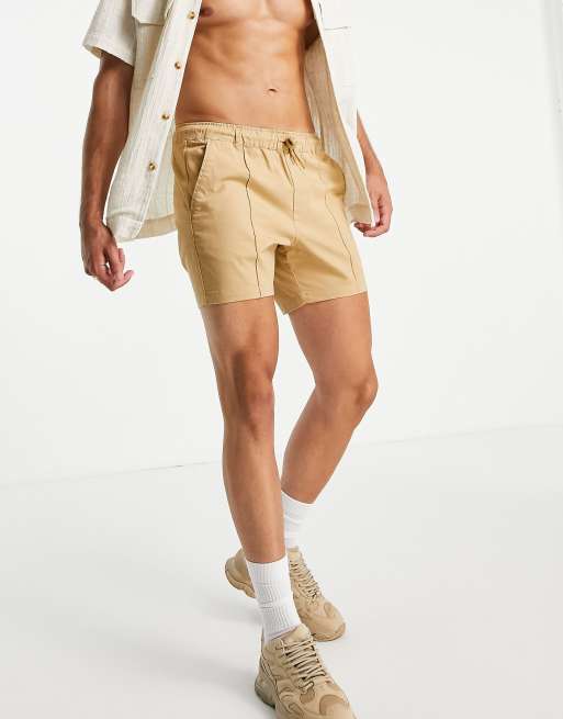 ASOS DESIGN - Short chino court ajusté à nervures et taille élastique - Jaune moutarde 