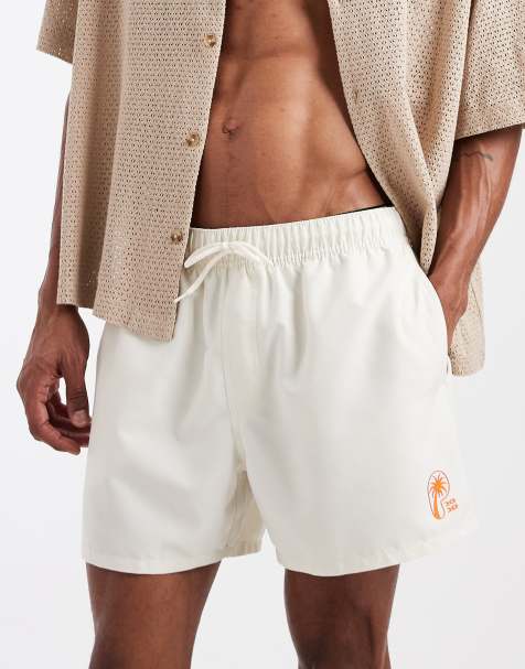 ASOS DESIGN - Short de bain court à imprimé placé en silicone - Crème - view 1