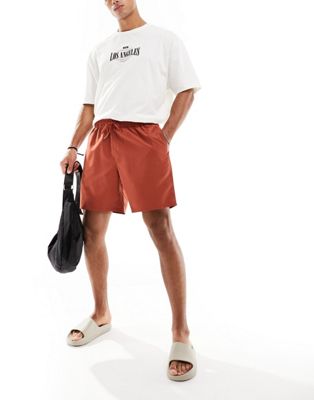 ASOS DESIGN swim shorts in mid length in rust - ASOS Price Checker