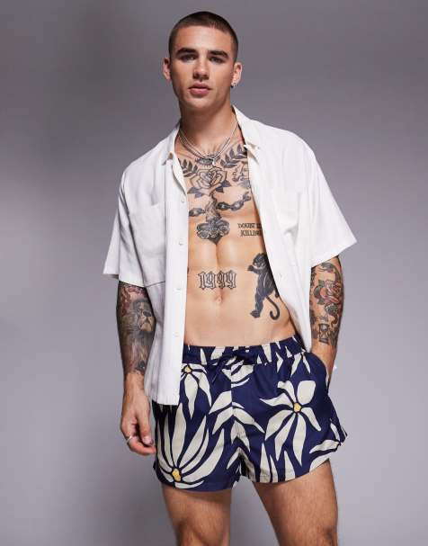 ASOS Design - Short de bain ultra court à imprimé pâquerettes - Bleu marine - view 1