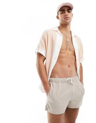 ASOS DESIGN swim shorts in super short length in beige - ASOS Price Checker