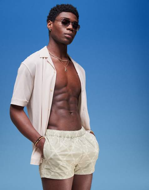 ASOS DESIGN - Short de bain ultra court en crépon à imprimé fleuri ton sur ton - Sauge - view 1