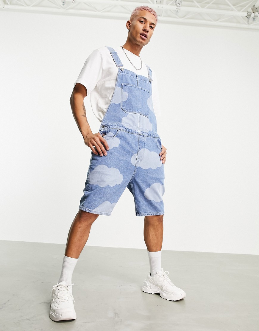 ASOS DESIGN short denim overalls in mid wash blue with cloud print-Blues