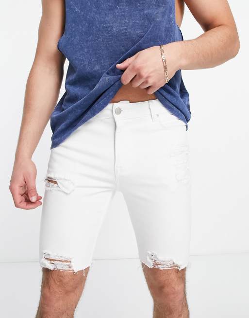 ASOS DESIGN - Short en jean power stretch effet vaporisé avec larges déchirures et ourlet brut - Blanc