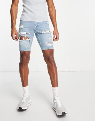 ASOS DESIGN - Short en jean slim à délavage moyen